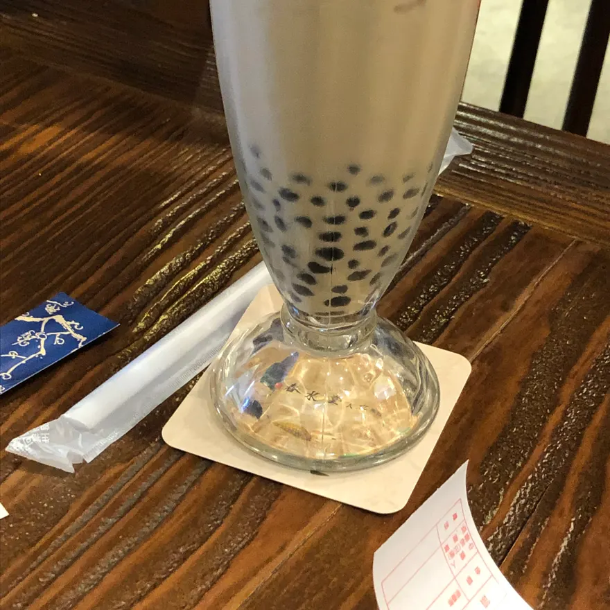 A glass of pearl milk tea