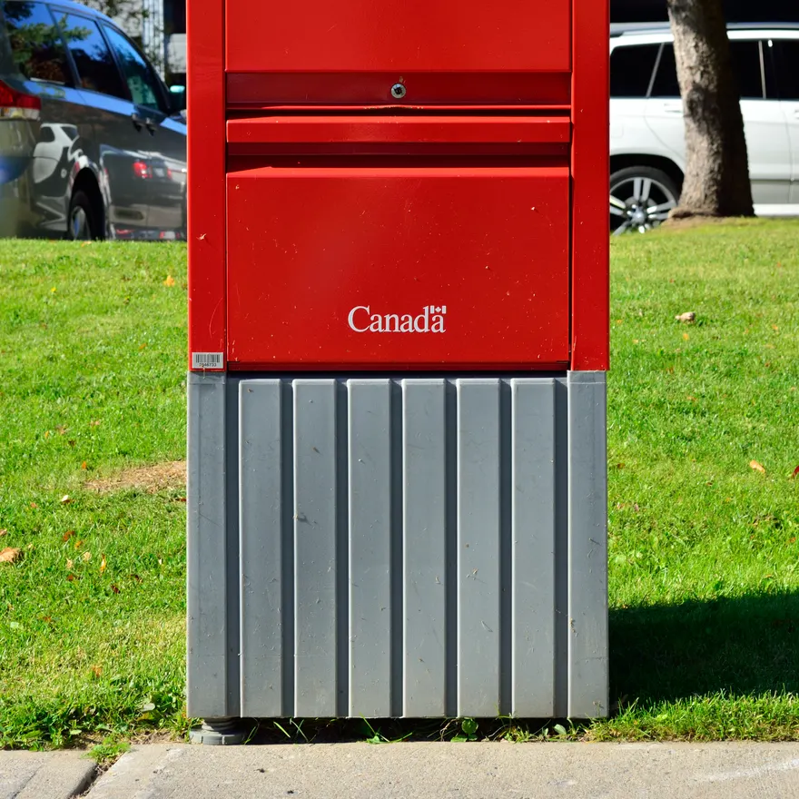 A red Canada Post mailbox