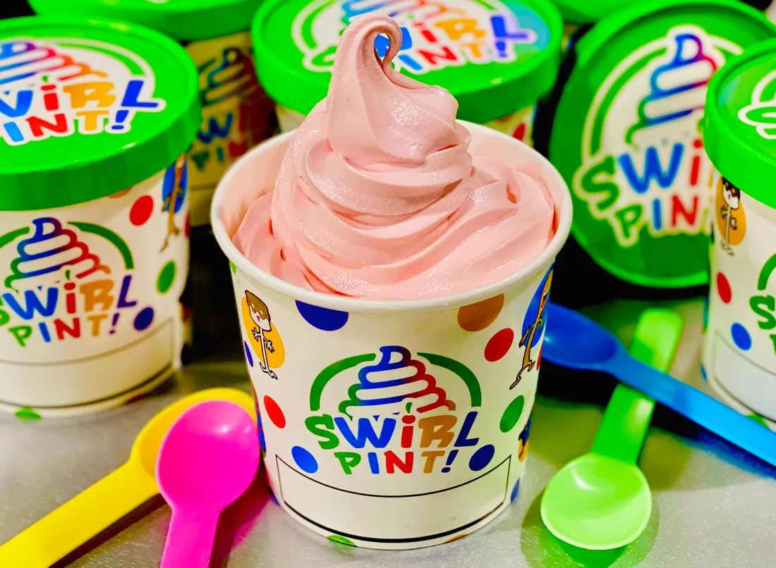 A fresh-packed Swirl World 24oz takeout pint